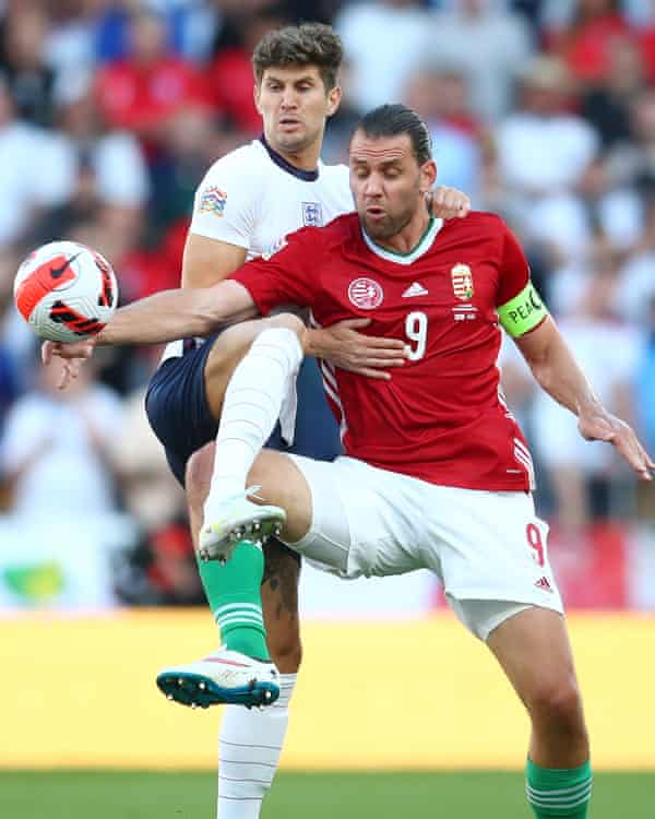 Adam Szalai of Hungary competes with John Stones of England during the Nations League match at Molineux on 14 June