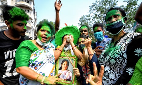 ‘The return of human empathy will remain as a reference point in our memory’. Trinamool Congress supports celebrate victory in Kolkata, West Bengal.