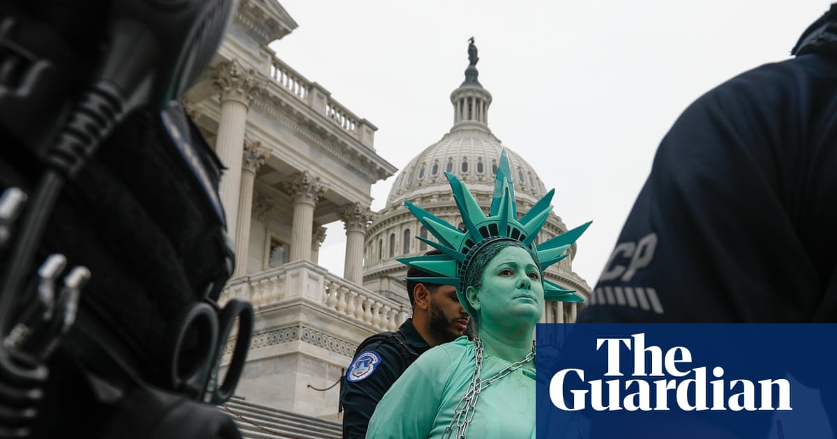 A Trump-Epstein statue, melting democracy and human banners: the art of protesting in 2025 - in pictures