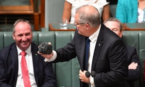 Scott Morrison with a lump of coal in parliament House in Canberra, Thursday, Feb. 9, 2017. (AAP Image/Mick Tsikas)