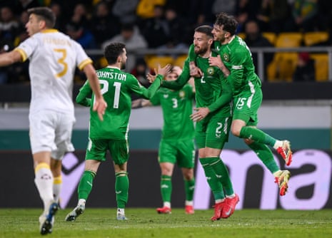 Matt Doherty of Republic of Ireland celebrates with teammates Troy Parrott, right, and Mikey Johnston after scoring their side's second goal.
