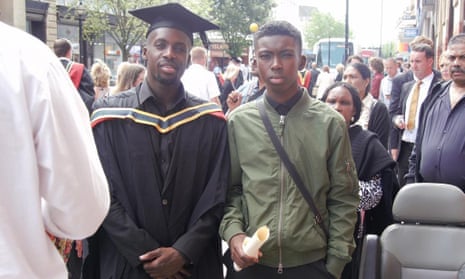 Derek Owusu at his graduation in 2015 with his brother Joel.
