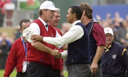 Bjørn shakes hands with Tiger Woods after Europe won the Ryder Cup at the Belfry in 2002.