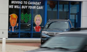 A painted sign in the window of a Honda dealership on Wednesday in Detroit, Michigan.