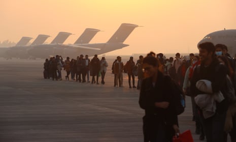Indian national students evacuated from crisis-hit Ukraine by Indian Air Force Plane arrive at Hindon Air Force Station in Ghaziabad, amid the ongoing Russian invasion.