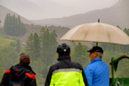 People watch the deluge.