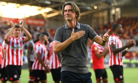 Brentford manager Thomas Frank applauds the fans after the final whistle.