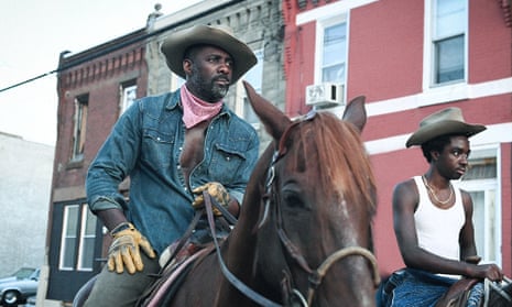 Idris Elba and Caleb McLaughlin in Concrete Cowboy.