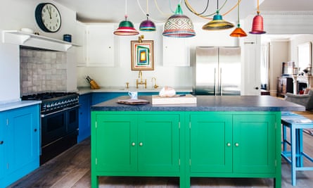 Cabinet shuffle: Harding &amp; Read used bold colours below the eyeline for this striking Plain English kitchen.