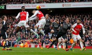 Danny Welbeck heads the winning goal for Arsenal.