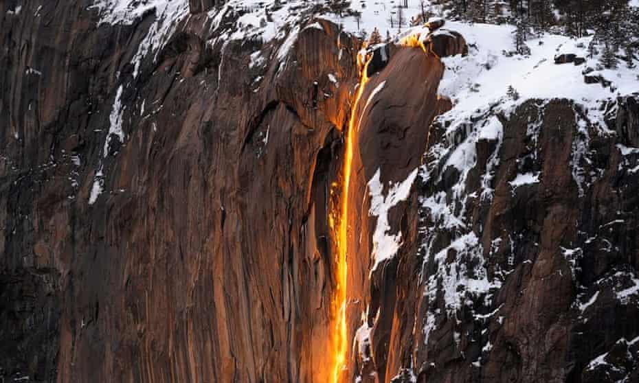 Sunlight hits the Horsetail Fall at Yosemite national park, California, 19 February 2019, in this photo taken from social media. 