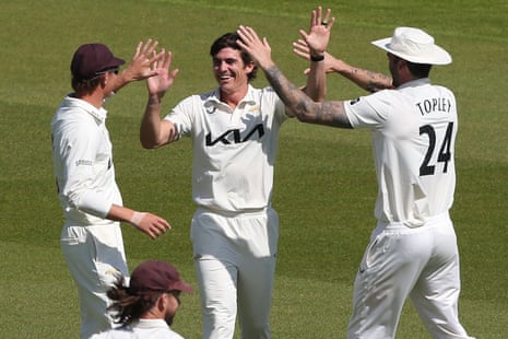 Sean Abbott of Surrey celebrates taking the wicket of Tom Haines