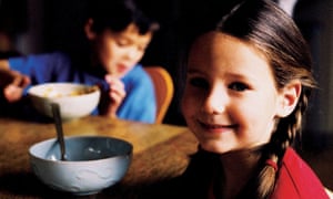 Children eating breakfast.