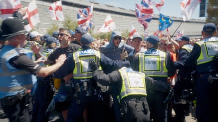 Far-right protesters clashing with police in a scene from the documentary