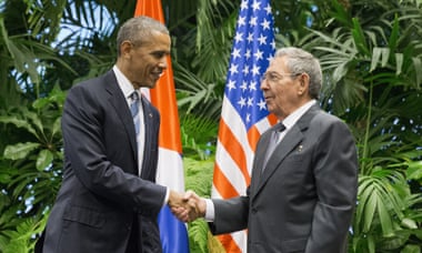 Barack Obama shakes hands with Cuban President Raul Castro during their meeting at the Palace of the Revolution in Havana, Cuba.