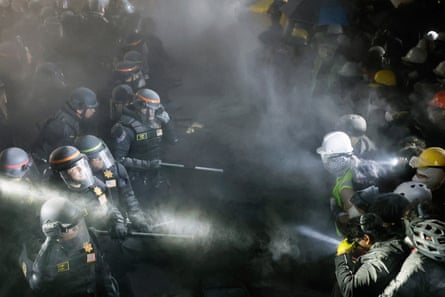 police and students facing each different