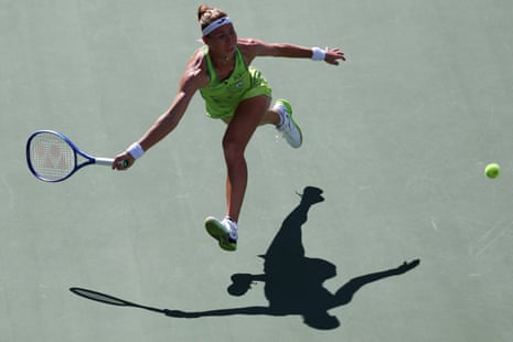 Marie Bouzkova chases down a shot
