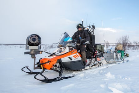 A snowmobile kitted out for filming the migrating reindeer.