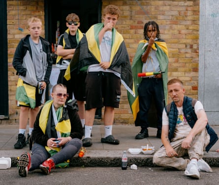 A family sporting Jamaican flags