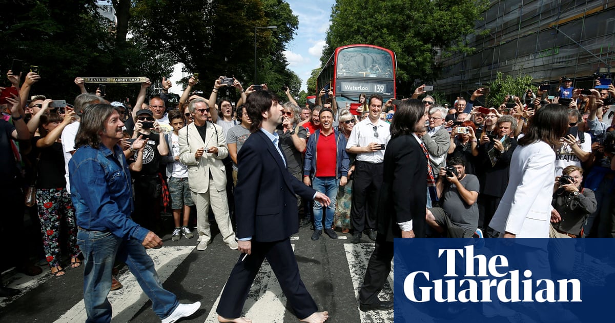 Come together: fans recreate Beatles Abbey Road photo 50 years on