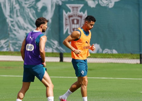 Portugal's Cristiano Ronaldo and Ruben Dias in training