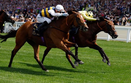 Docklands, ridden by Mark Zahra (nearside), just beats Rosallion to win the Queen Anne Stakes at Royal Ascot.