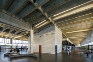 The station’s minimalist interior, with iroko benches and black rubber Pirelli floor.