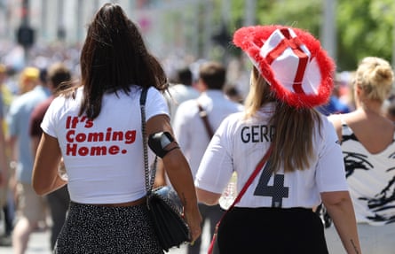 Fans wearing shirts saying ‘It’s coming home’ and ‘Gerrard 4’.