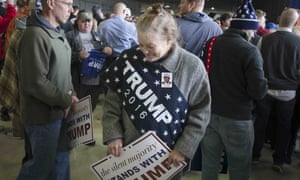 Linda Gore stands in the crowd as she waits for the arrival of Republican presidential candidate Donald Trump speaks ahead of a campaign stop at the Signature Flight Hangar at Port-Columbus International Airport, Tuesday, March 1, 2016, in Columbus, Ohio. (AP Photo/John Minchillo)