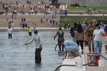 Workers in the reflecting pool