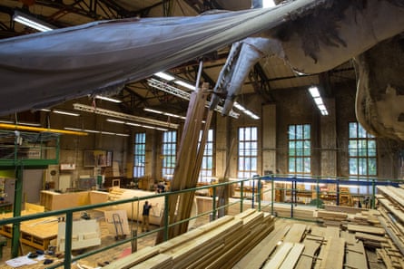 A giant pterodactyl from a past production hangs over the Volksbühne workshop.
