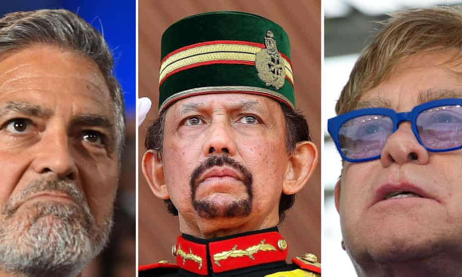 From left to right, George Clooney, the Sultan of Brunei Hassanal Bolkiah and Elton John. The actor and singer-songwriter have called for a boycott of luxury hotels owned by the south-east Asian kingdom