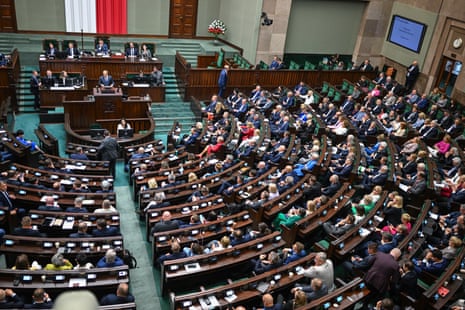 Donald Tusk delivers a speech ahead of a vote on his government at the Polish parliament in Warsaw, Poland.