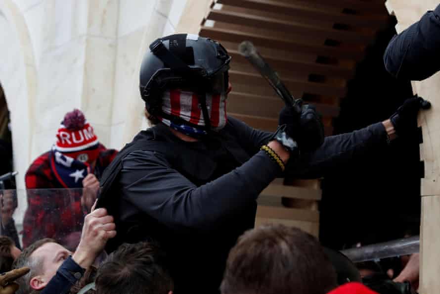 Pro-Trump rioters clash with Capitol police on 6 January.