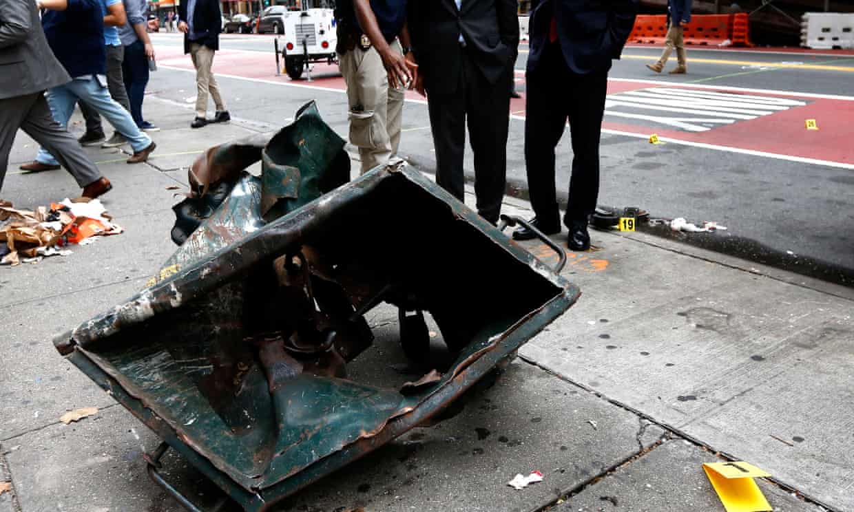 A dumpster mangled by an explosion in New York.