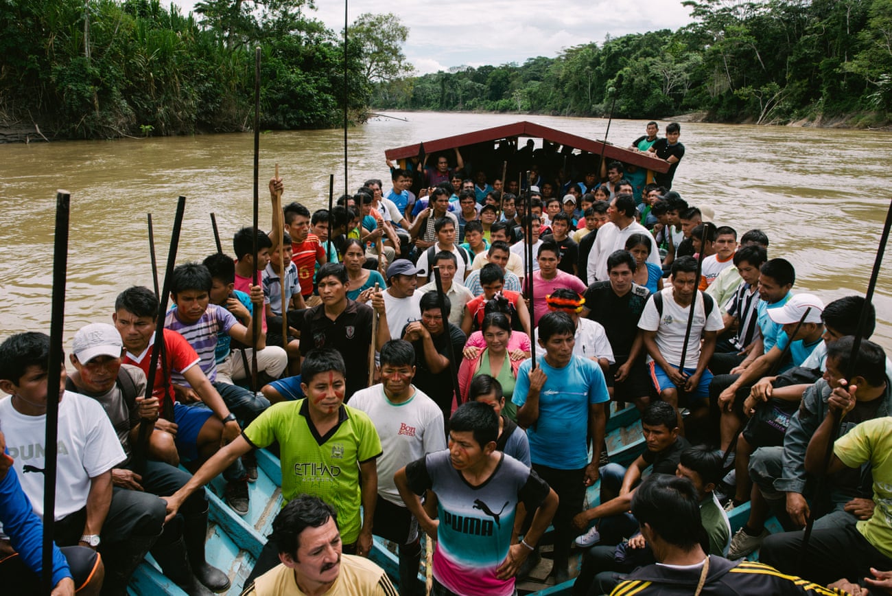 Close to 150 Wampis warriors head towards an illegal gold mining site on the Santiago river