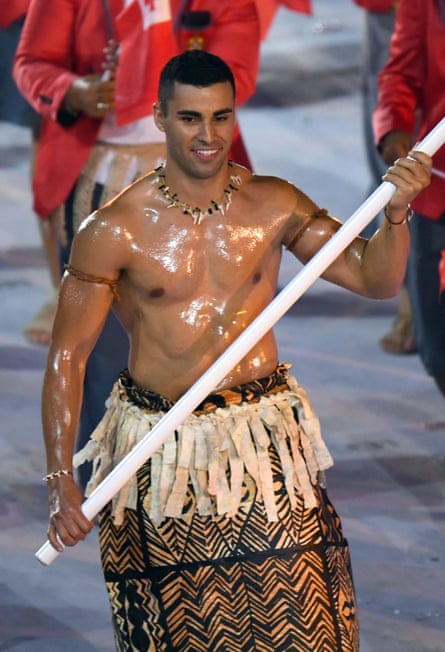 Pita Taufatofua leads his delegation during the opening ceremony of the Rio 2016 Olympic Games