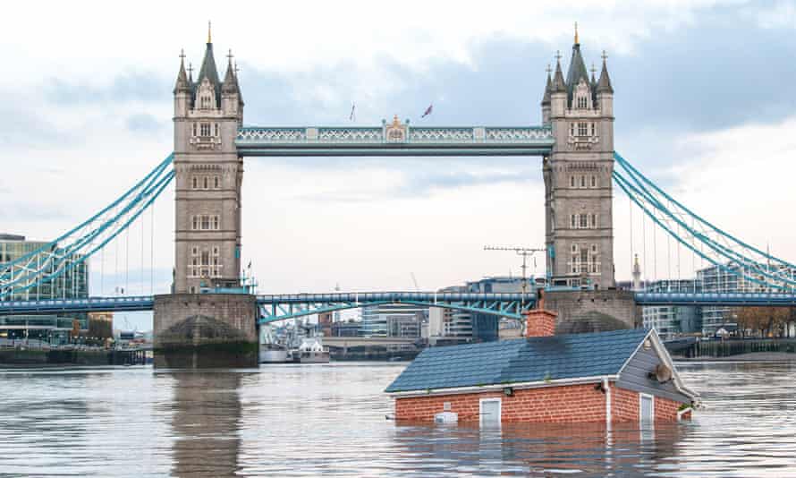A ‘sinking house’ floated down the River Thames in London by Extinction Rebellion protesters in November 2019.