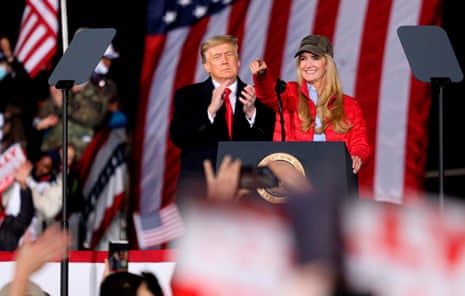 Donald Trump with then-senator Kelly Loeffler at a rally in Dalton, Georgia on 4 January 2021, the night before Republicans lost a pair of Senate runoffs as Trump claimed that elections in the state were “rigged”, despite being administered by Republican officials.