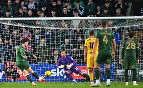 Ryan Hardie of Plymouth Argyle scores his team's second goal from the penalty spot.