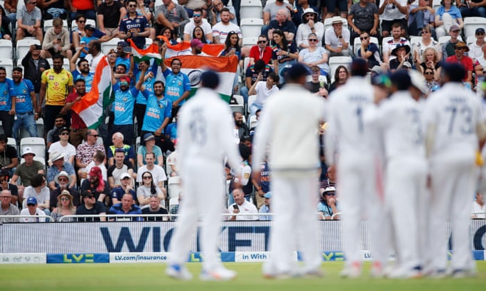 India fans celebrate after Mohammed Shami took the wicket of England’s Jonny Bairstow for lbw.