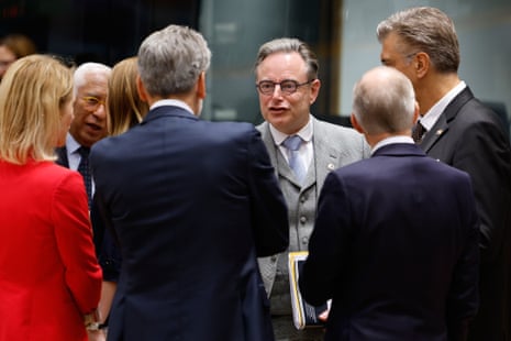Belgium’s prime minister Bart De Wever, center, speaks with Netherland’s prime minister Dick Schoof, center, and Croatia’s prime minister Andrej Plenkovic, right, during a round table meeting at an EU Summit in Brussels, Thursday, Oct. 23, 2025.