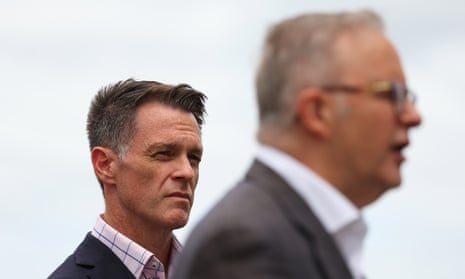 NSW premier Chris Minns looks on as Anthony Albanese speaks at a press conference in January