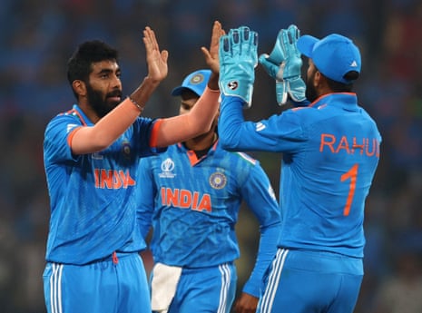 India's Jasprit Bumrah celebrates with KL Rahul after taking the wicket of England's . REUTERS/Andrew Boyers