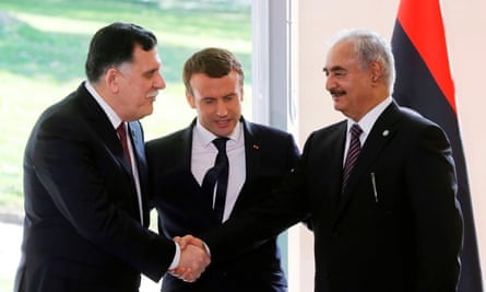 Macron brokers a meeting between warring factions in Libya.