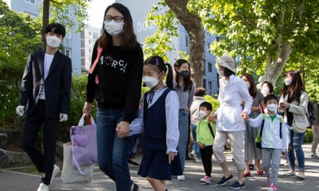 Pupils return to school in Seoul, South Korea, 27 May
