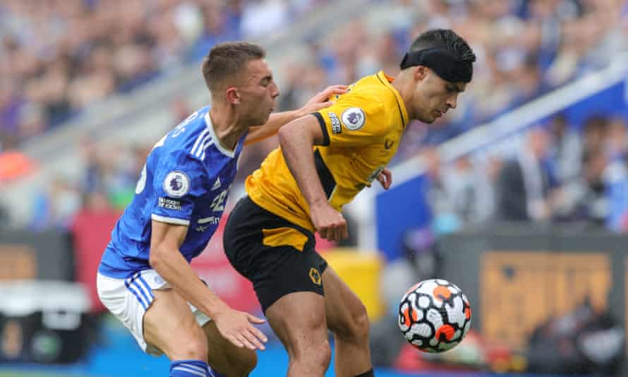 Raúl Jiménez plays against Leicester while wearing a headguard.