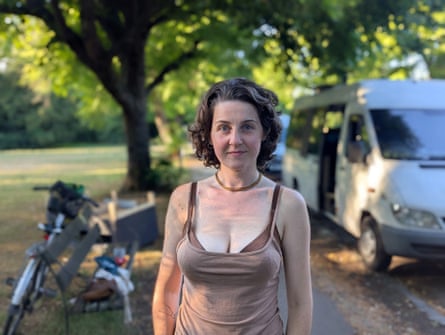 Amy Dickson standing in front of her van in the park