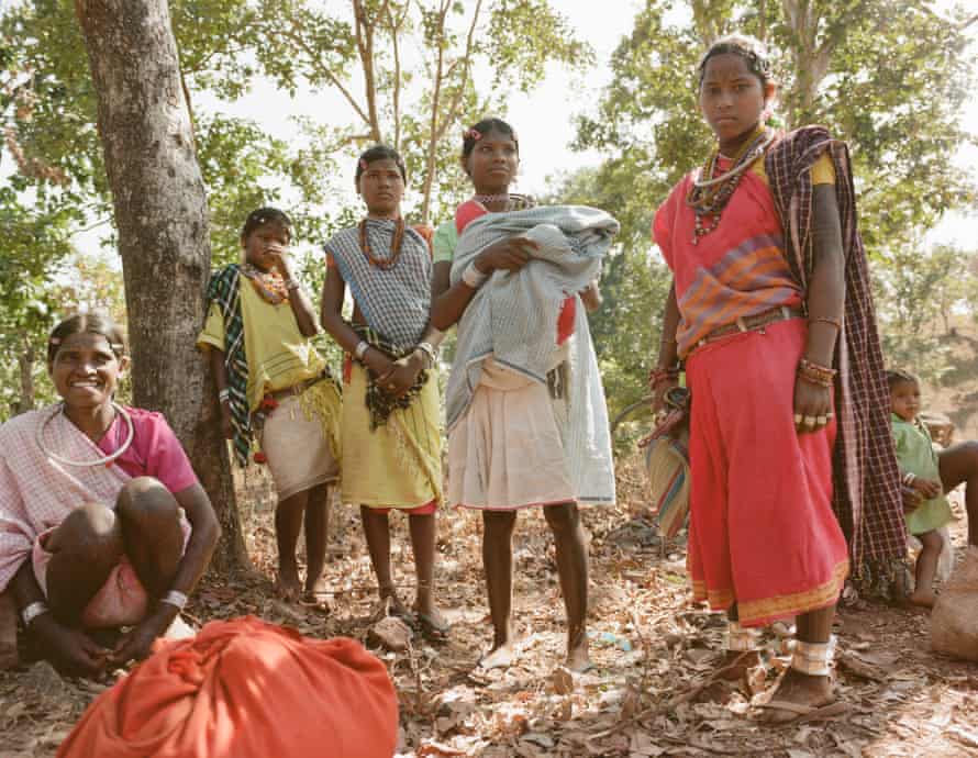 Baiga women on their way to market through the forest.