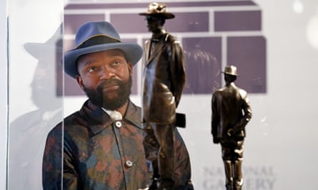 Artist Samson Kambalu with a model of his planned fourth plinth sculpture.